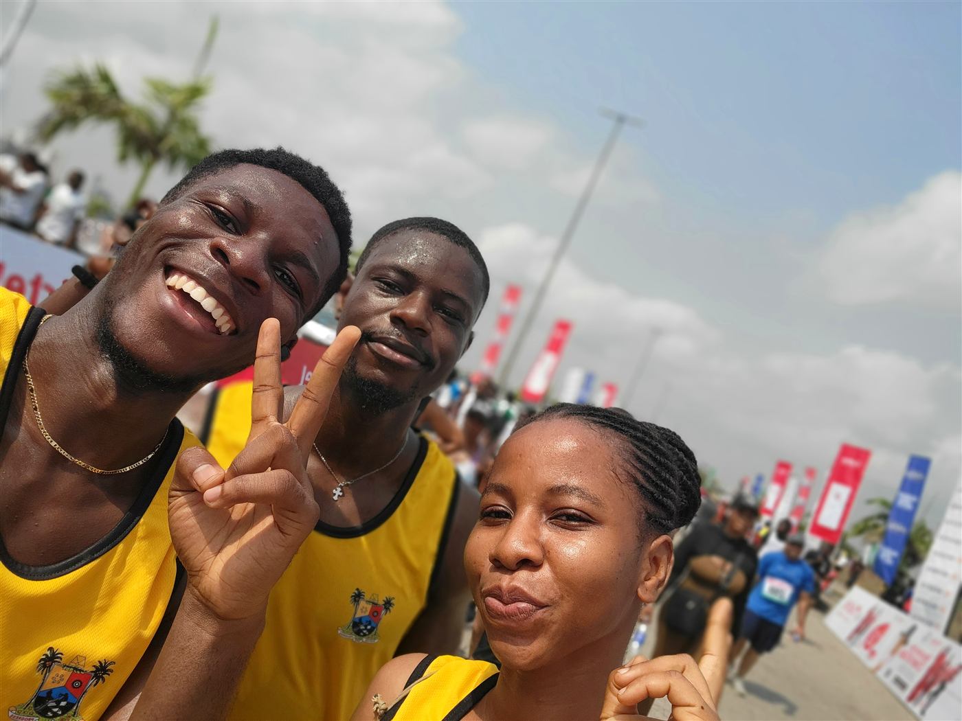 Tolulope Ajidahun celebrating with friends after finishing the Lagos city annual race